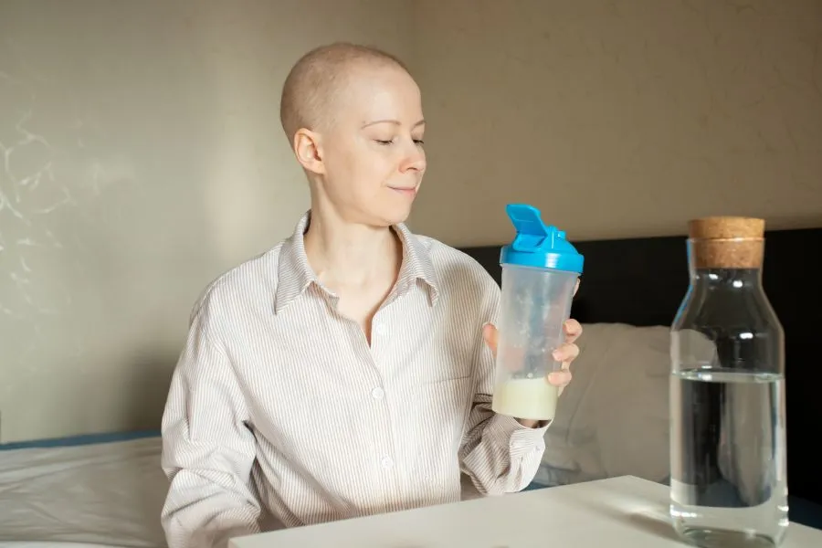 Hospital patient with a protein shake